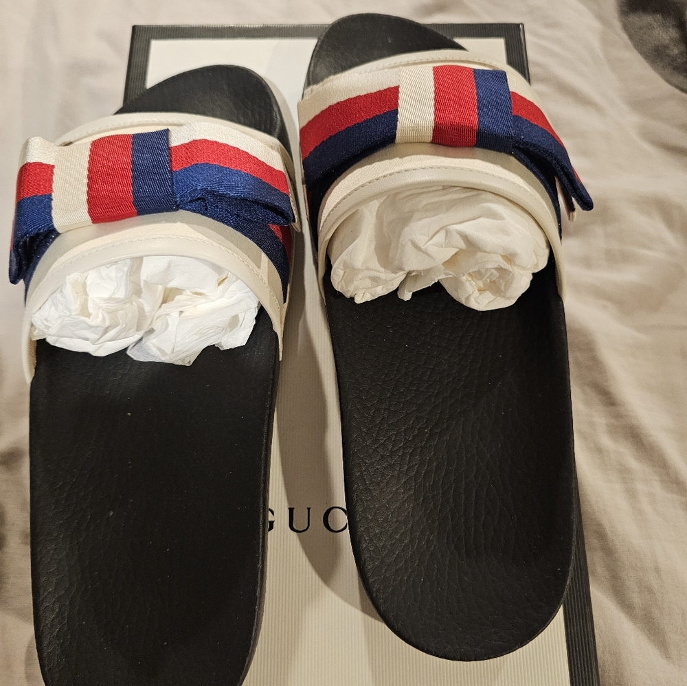 Brand new authentic Gucci "Sylvie Bow Slides"
